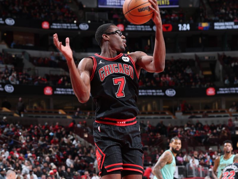 CHICAGO, IL - DECEMBER 13: Jalen Smith #7 of the Chicago Bulls goes up for the rebound during the game against the Charlotte Hornets on December 13, 2024 at United Center in Chicago, Illinois. NOTE TO USER: User expressly acknowledges and agrees that, by downloading and or using this photograph, User is consenting to the terms and conditions of the Getty Images License Agreement. Mandatory Copyright Notice: Copyright 2024 NBAE (Photo by Jeff Haynes/NBAE via Getty Images)