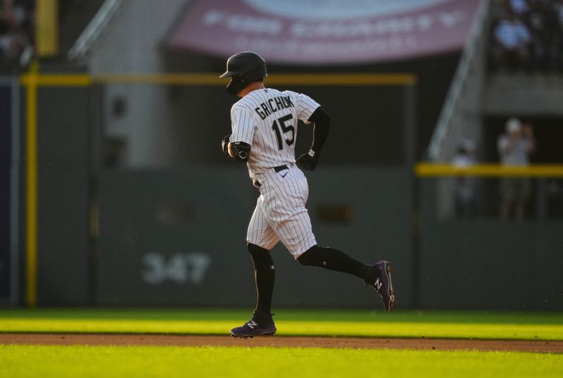 Jul 14, 2023; Denver, Colorado, USA; Colorado Rockies right fielder Randal Grichuk (15) runs out his solo home run in fourth inning against the New York Yankees at Coors Field. Mandatory Credit: Ron Chenoy-USA TODAY Sports