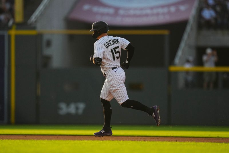 Jul 14, 2023; Denver, Colorado, USA; Colorado Rockies right fielder Randal Grichuk (15) runs out his solo home run in fourth inning against the New York Yankees at Coors Field. Mandatory Credit: Ron Chenoy-USA TODAY Sports