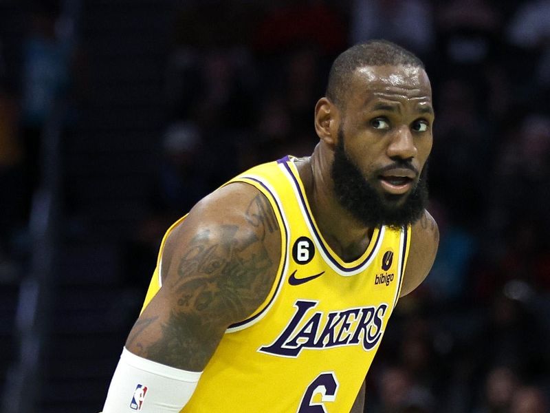 CHARLOTTE, NORTH CAROLINA - JANUARY 02: LeBron James #6 of the Los Angeles Lakers looks over the court during the second half of the game against the Charlotte Hornets at Spectrum Center on January 02, 2023 in Charlotte, North Carolina. NOTE TO USER: User expressly acknowledges and agrees that, by downloading and or using this photograph, User is consenting to the terms and conditions of the Getty Images License Agreement. (Photo by Jared C. Tilton/Getty Images)