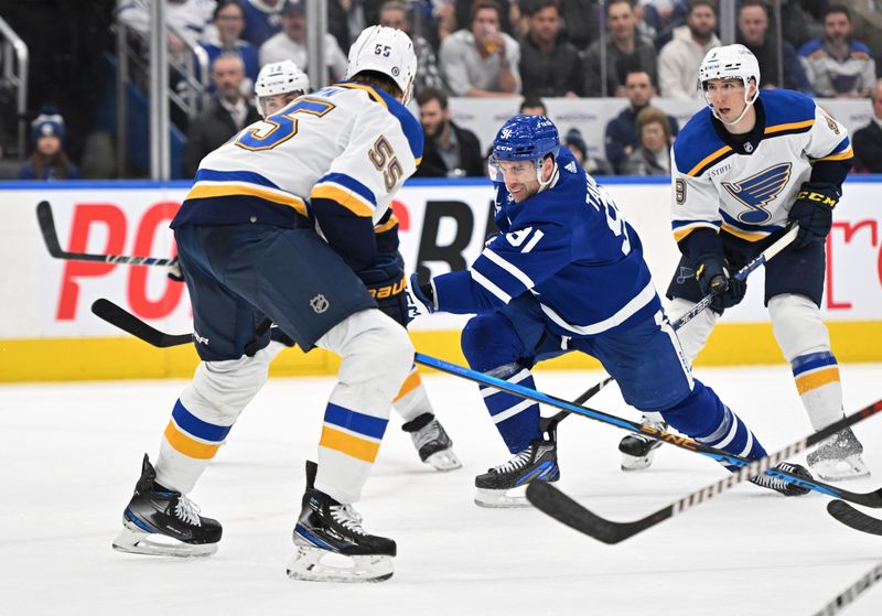 Jan 3, 2023; Toronto, Ontario, CAN; Toronto Maple Leafs forward John Tavares (91) shoots the puck past St. Louis Blues defenseman Colton Parayko (55) in the third period at Scotiabank Arena. Mandatory Credit: Dan Hamilton-USA TODAY Sports