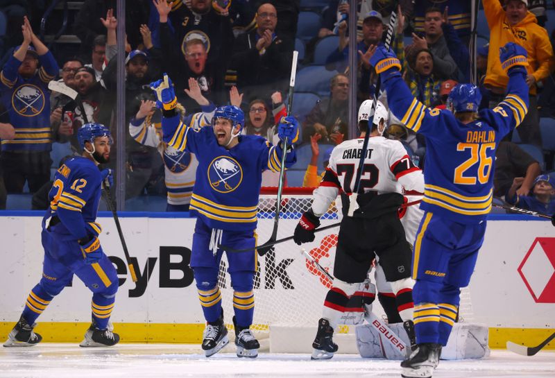 Nov 5, 2024; Buffalo, New York, USA;  Buffalo Sabres left wing Jason Zucker (17) reacts after his team scores a goal during the third period against the Ottawa Senators at KeyBank Center. Mandatory Credit: Timothy T. Ludwig-Imagn Images