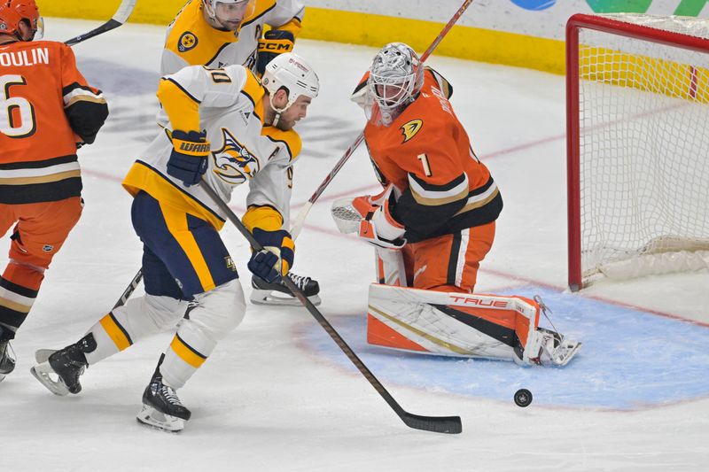 Jan 25, 2025; Anaheim, California, USA; Nashville Predators center Ryan O'Reilly (90) scores past Anaheim Ducks goaltender Lukas Dostal (1) in the second period at Honda Center. Mandatory Credit: Jayne Kamin-Oncea-Imagn Images