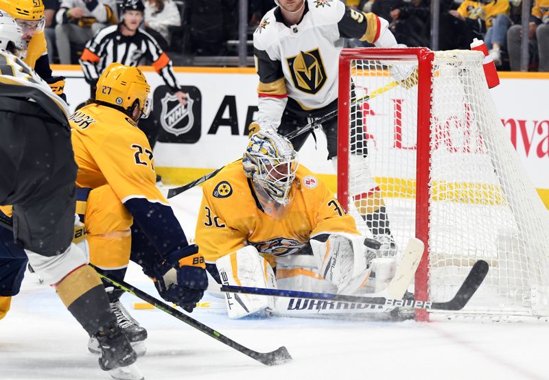 Apr 4, 2023; Nashville, Tennessee, USA; Nashville Predators goaltender Kevin Lankinen (32) makes a save during the second period against the Vegas Golden Knights at Bridgestone Arena. Mandatory Credit: Christopher Hanewinckel-USA TODAY Sports