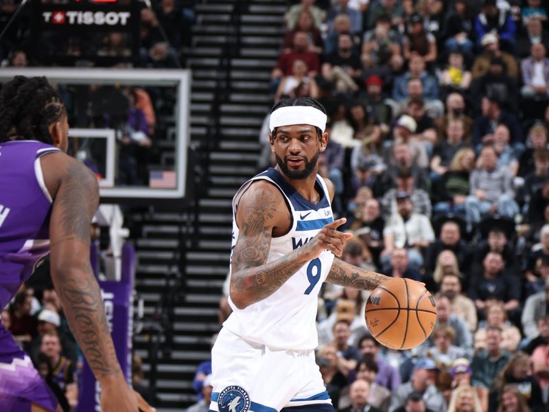 SALT LAKE CITY, UT - MARCH 18: Nickeil Alexander-Walker #9 of the Minnesota Timberwolves handles the ball during the game against the Utah Jazz on March 18, 2024 at Delta Center in Salt Lake City, Utah. NOTE TO USER: User expressly acknowledges and agrees that, by downloading and or using this Photograph, User is consenting to the terms and conditions of the Getty Images License Agreement. Mandatory Copyright Notice: Copyright 2024 NBAE (Photo by Melissa Majchrzak/NBAE via Getty Images)