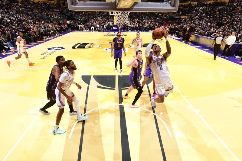 LOS ANGELES, CA - NOVEMBER 29: Shai Gilgeous-Alexander #2 of the Oklahoma City Thunder drives to the basket during the game against the Los Angeles Lakers during a Emirates NBA Cup game on October 22, 2024 at Crypto.Com Arena in Los Angeles, California. NOTE TO USER: User expressly acknowledges and agrees that, by downloading and/or using this Photograph, user is consenting to the terms and conditions of the Getty Images License Agreement. Mandatory Copyright Notice: Copyright 2024 NBAE (Photo by Adam Pantozzi/NBAE via Getty Images)