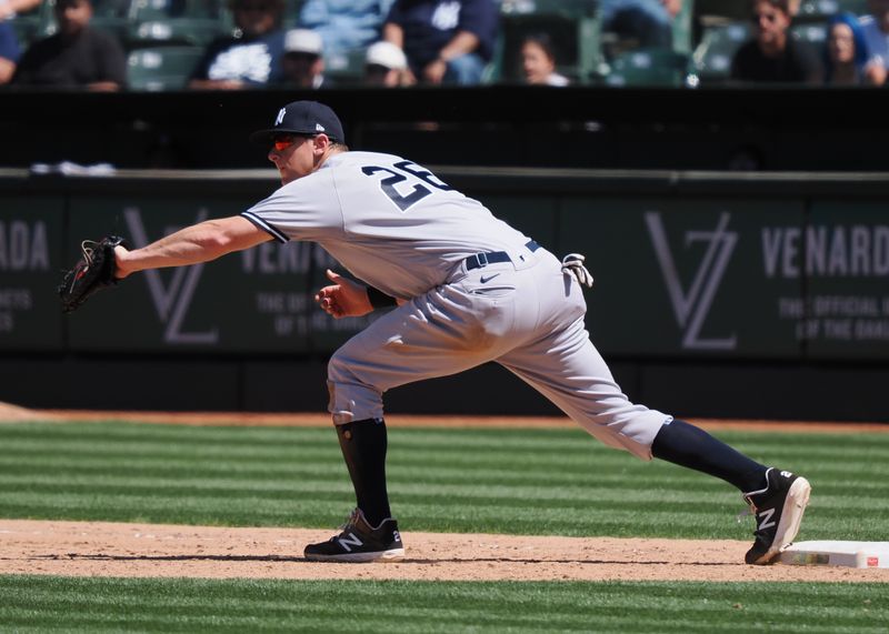 Jun 29, 2023; Oakland, California, USA; New York Yankees first baseman DJ LeMahieu (26) catches the ball against the Oakland Athletics during the ninth inning at Oakland-Alameda County Coliseum. Mandatory Credit: Kelley L Cox-USA TODAY Sports