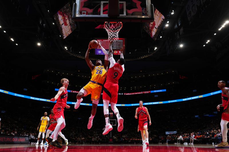 TORONTO, CANADA - NOVEMBER 1: Rui Hachimura #28 of the Los Angeles Lakers drives to the basket during the game against the Toronto Raptors on November 1, 2024 at the Scotiabank Arena in Toronto, Ontario, Canada.  NOTE TO USER: User expressly acknowledges and agrees that, by downloading and or using this Photograph, user is consenting to the terms and conditions of the Getty Images License Agreement.  Mandatory Copyright Notice: Copyright 2024 NBAE (Photo by Mark Blinch/NBAE via Getty Images)