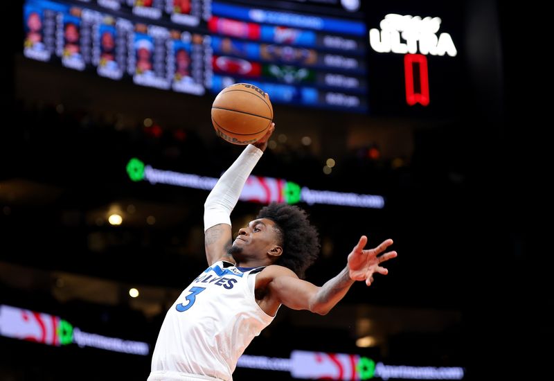 ATLANTA, GEORGIA - OCTOBER 30:  Jaden McDaniels #3 of the Minnesota Timberwolves dunks against the Atlanta Hawks during the first quarter at State Farm Arena on October 30, 2023 in Atlanta, Georgia.  NOTE TO USER: User expressly acknowledges and agrees that, by downloading and/or using this photograph, user is consenting to the terms and conditions of the Getty Images License Agreement.  (Photo by Kevin C. Cox/Getty Images)