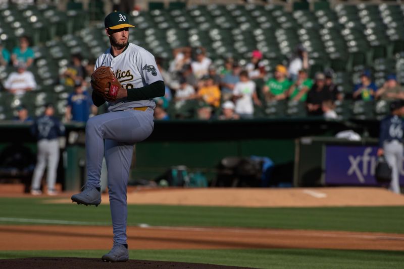 Jun 4, 2024; Oakland, California, USA; Oakland Athletics pitcher Mitch Spence (40) throws a pitch during the first inning against the Seattle Mariners at Oakland-Alameda County Coliseum. Mandatory Credit: Ed Szczepanski-USA TODAY Sports