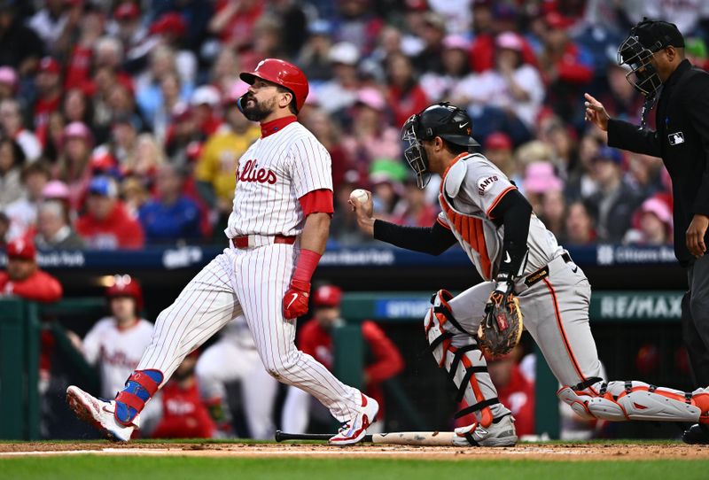 May 5, 2024; Philadelphia, Pennsylvania, USA; San Francisco Giants catcher Blake Sabol (21) tags out Philadelphia Phillies designated hitter Kyle Schwarber (12) after striking out in the first inning at Citizens Bank Park. Mandatory Credit: Kyle Ross-USA TODAY Sports