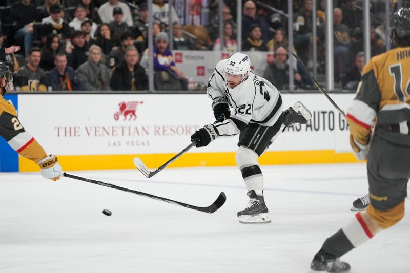 Dec 28, 2023; Las Vegas, Nevada, USA; Los Angeles Kings left wing Kevin Fiala (22) shoots the puck against the Vegas Golden Knights during the first period at T-Mobile Arena. Mandatory Credit: Lucas Peltier-USA TODAY Sports