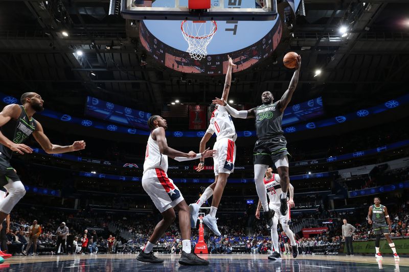 WASHINGTON, DC -? JANUARY 13:  Julius Randle #30 of the Minnesota Timberwolves drives to the basket during the game against the Washington Wizards on January 13, 2025 at Capital One Arena in Washington, DC. NOTE TO USER: User expressly acknowledges and agrees that, by downloading and or using this Photograph, user is consenting to the terms and conditions of the Getty Images License Agreement. Mandatory Copyright Notice: Copyright 2025 NBAE (Photo by Stephen Gosling/NBAE via Getty Images)