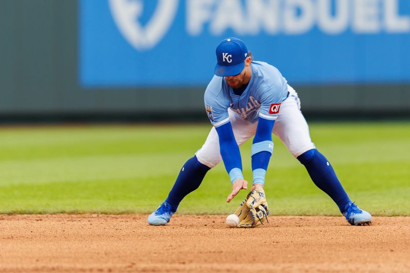 Apr 27, 2025; Kansas City, Missouri, USA; Kansas City Royals shortstop Bobby Witt Jr. (7) fields the ball during the ninth inning against the Houston Astros at Kauffman Stadium. Mandatory Credit: William Purnell-Imagn Images