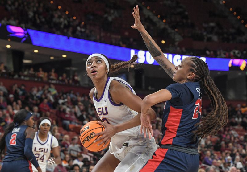 Mar 9, 2024; Greenville, SC, USA; LSU Tigers forward Angel Reese (10) shoots the ball against Ole Miss Rebels forward Madison Scott (24) during the second quarter at the Bon Secours Wellness Arena. Mandatory Credit: Ken Ruinard/The Greenville News via USA TODAY NETWORK