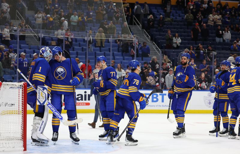 Nov 5, 2024; Buffalo, New York, USA;  The Buffalo Sabres celebrate a win over the Ottawa Senators at KeyBank Center. Mandatory Credit: Timothy T. Ludwig-Imagn Images