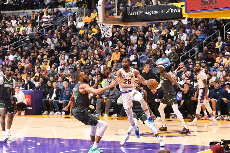 LOS ANGELES, CA - APRIL 7:  Spencer Dinwiddie #26 of the Los Angeles Lakers passes the ball during the game against the Minnesota Timberwolveson April 7, 2024 at Crypto.Com Arena in Los Angeles, California. NOTE TO USER: User expressly acknowledges and agrees that, by downloading and/or using this Photograph, user is consenting to the terms and conditions of the Getty Images License Agreement. Mandatory Copyright Notice: Copyright 2024 NBAE (Photo by Juan Ocampo/NBAE via Getty Images)