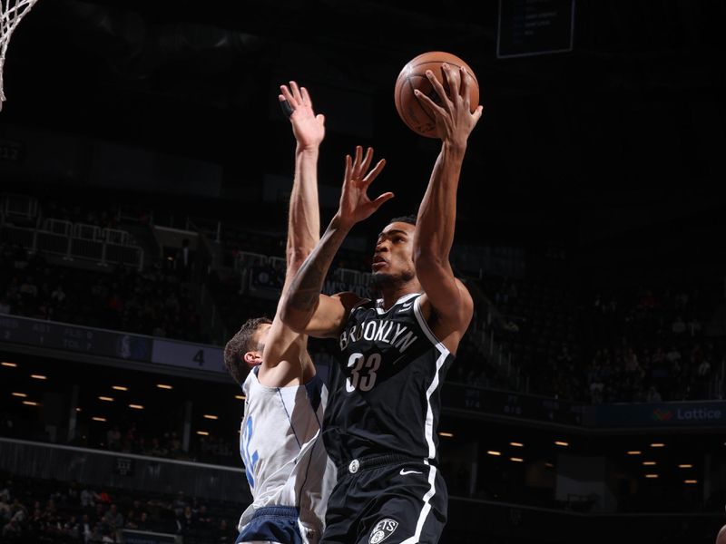 BROOKLYN, NY - FEBRUARY 6: Nicolas Claxton #33 of the Brooklyn Nets goes to the basket during the game on February 6, 2024 at Barclays Center in Brooklyn, New York. NOTE TO USER: User expressly acknowledges and agrees that, by downloading and or using this Photograph, user is consenting to the terms and conditions of the Getty Images License Agreement. Mandatory Copyright Notice: Copyright 2024 NBAE (Photo by Nathaniel S. Butler/NBAE via Getty Images)