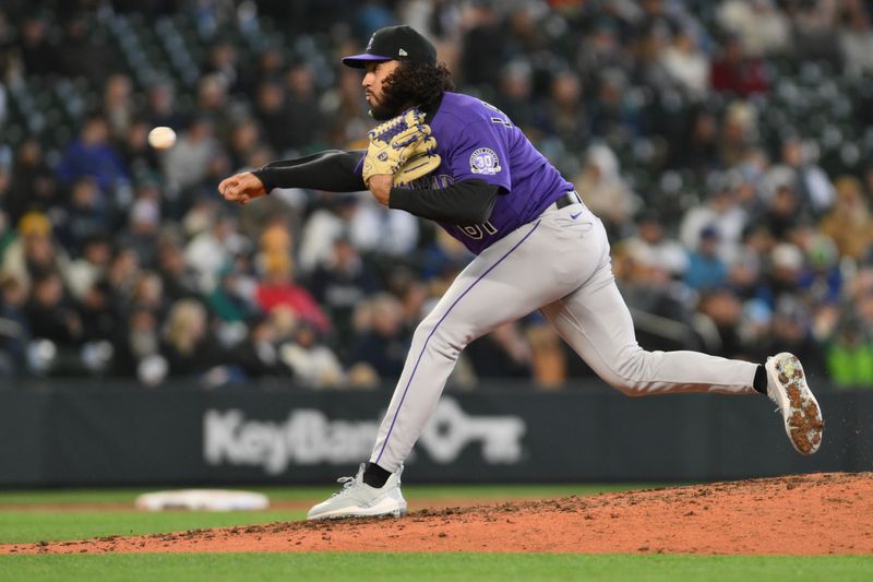 Apr 16, 2023; Seattle, Washington, USA; Colorado Rockies relief pitcher Justin Lawrence (61) pitches to the Seattle Mariners during the eighth inning at T-Mobile Park. Mandatory Credit: Steven Bisig-USA TODAY Sports