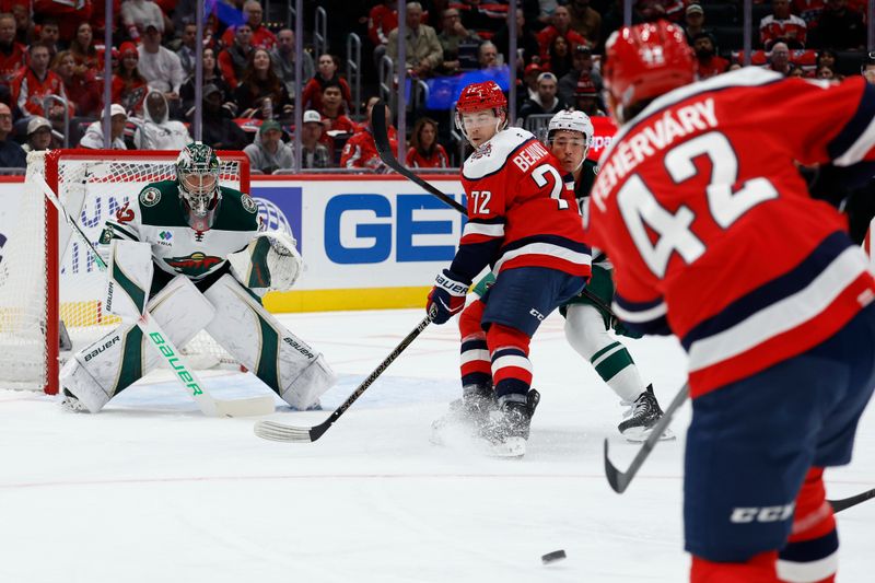 Oct 17, 2025; Washington, District of Columbia, USA; Washington Capitals defenseman Martin Fehérváry (42) shoots the puck on Minnesota Wild goaltender Filip Gustavsson (32) during the first period at Capital One Arena. Mandatory Credit: Geoff Burke-Imagn Images