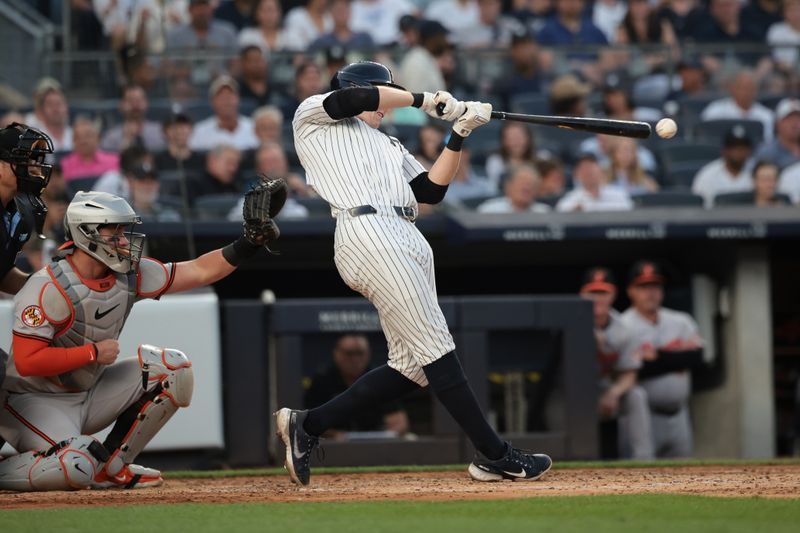 Jun 18, 2024; Bronx, New York, USA; New York Yankees first baseman Ben Rice (93) singles during the third inning against the Baltimore Orioles at Yankee Stadium. Mandatory Credit: Vincent Carchietta-USA TODAY Sports