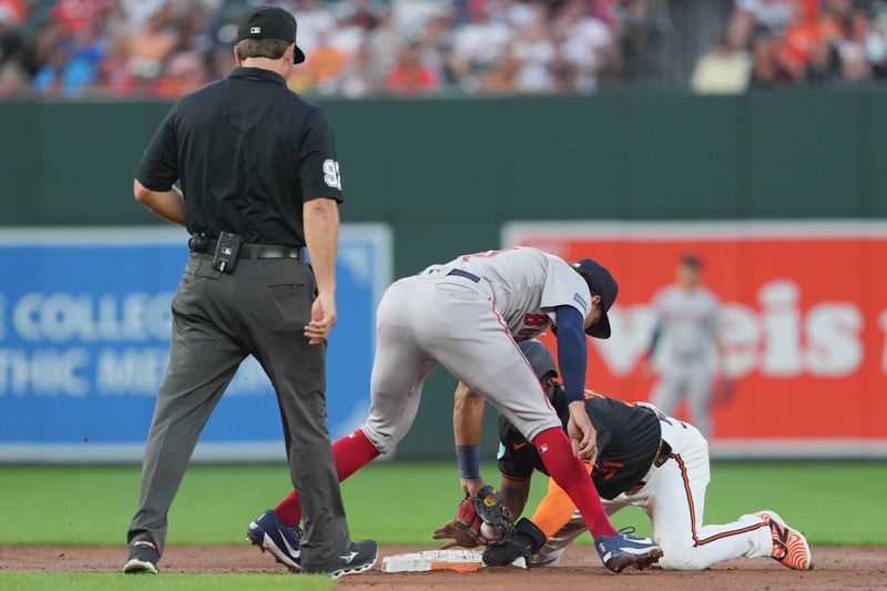 Aug 15, 2024; Baltimore, Maryland, USA; Baltimore Orioles outfielder Cedric Mullins (31) steals second base in the third inning against the Boston Red Sox at Oriole Park at Camden Yards. Mandatory Credit: Mitch Stringer-USA TODAY Sports