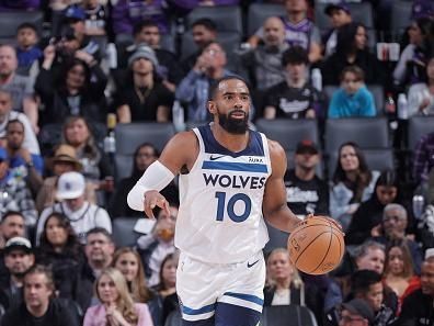 SACRAMENTO, CA - DECEMBER 23: Mike Conley #10 of the Minnesota Timberwolves brings the ball up court against the Sacramento Kings on December 23, 2023 at Golden 1 Center in Sacramento, California. NOTE TO USER: User expressly acknowledges and agrees that, by downloading and or using this Photograph, user is consenting to the terms and conditions of the Getty Images License Agreement. Mandatory Copyright Notice: Copyright 2023 NBAE (Photo by Rocky Widner/NBAE via Getty Images)