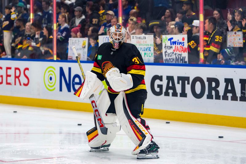 Oct 28, 2024; Vancouver, British Columbia, CAN; Vancouver Canucks goalie Arturs Silovs (31) skates during warm up prior to a game against the Carolina Hurricanes at Rogers Arena. Mandatory Credit: Bob Frid-Imagn Images