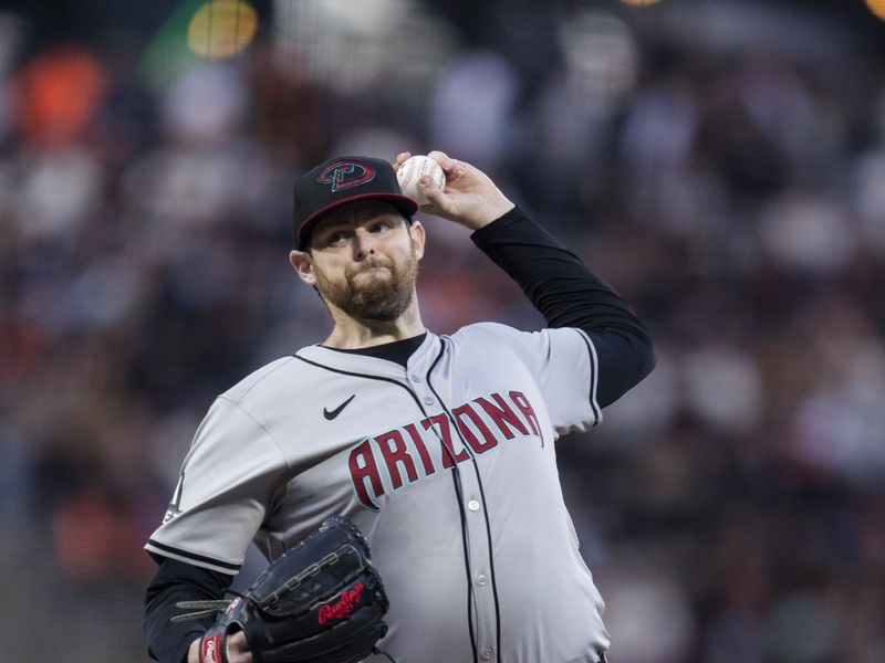 Apr 19, 2024; San Francisco, California, USA;  Arizona Diamondbacks starting pitcher Jordan Montgomery (52) throws against the San Francisco Giants during the first inning at Oracle Park. Mandatory Credit: John Hefti-USA TODAY Sports