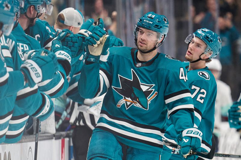 Jan 30, 2024; San Jose, California, USA; San Jose Sharks defenseman Marc-Edouard Vlasic (44) shakes hands with his teammates after scoring a goal against the Seattle Kraken during the third period at SAP Center at San Jose. Mandatory Credit: Robert Edwards-USA TODAY Sports