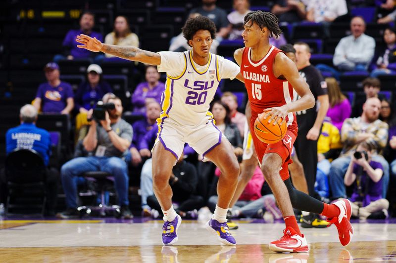 Feb 4, 2023; Baton Rouge, Louisiana, USA; Alabama Crimson Tide forward Noah Clowney (15) drives to the basket against LSU Tigers forward Derek Fountain (20) during the first half at Pete Maravich Assembly Center. Mandatory Credit: Andrew Wevers-USA TODAY Sports