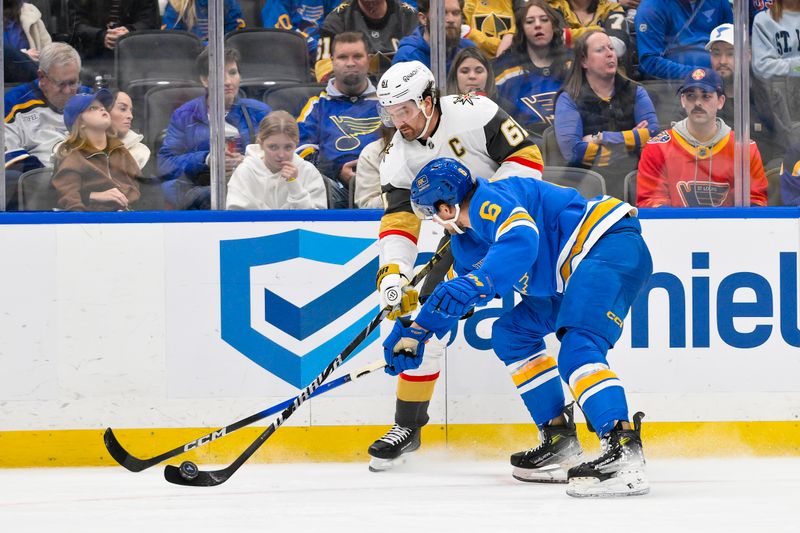 Jan 2, 2026; St. Louis, Missouri, USA; Vegas Golden Knights right wing Mark Stone (61) passes the puck as St. Louis Blues defenseman Philip Broberg (6) defends during the third period at Enterprise Center. Mandatory Credit: Jeff Curry-Imagn Images