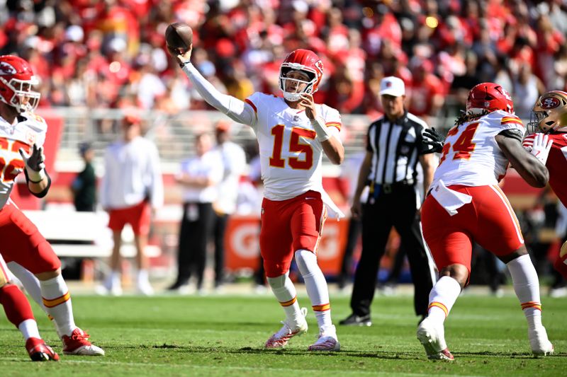 Kansas City Chiefs quarterback Patrick Mahomes (15) passes against the San Francisco 49ers during the first half of an NFL football game in Santa Clara, Calif., Sunday, Oct. 20, 2024. (AP Photo/Eakin Howard)