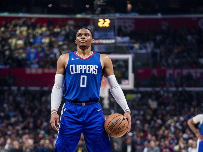 LOS ANGELES, CA - JANUARY 23:  Russell Westbrook #0 of the LA Clippers shoots a free throw during the game on January 23, 2024 at Crypto.Com Arena in Los Angeles, California. NOTE TO USER: User expressly acknowledges and agrees that, by downloading and/or using this Photograph, user is consenting to the terms and conditions of the Getty Images License Agreement. Mandatory Copyright Notice: Copyright 2024 NBAE (Photo by Tyler Ross/NBAE via Getty Images)