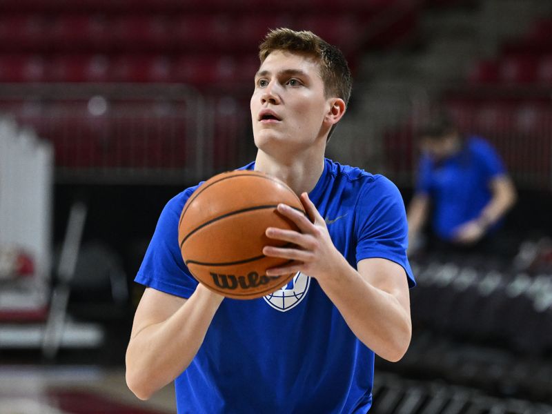 Jan 7, 2023; Chestnut Hill, Massachusetts, USA; Duke Blue Devils guard Jaden Schutt (14) takes a shot during warmups before a game against the Boston College Eagles
at the Conte Forum. Mandatory Credit: Brian Fluharty-USA TODAY Sports