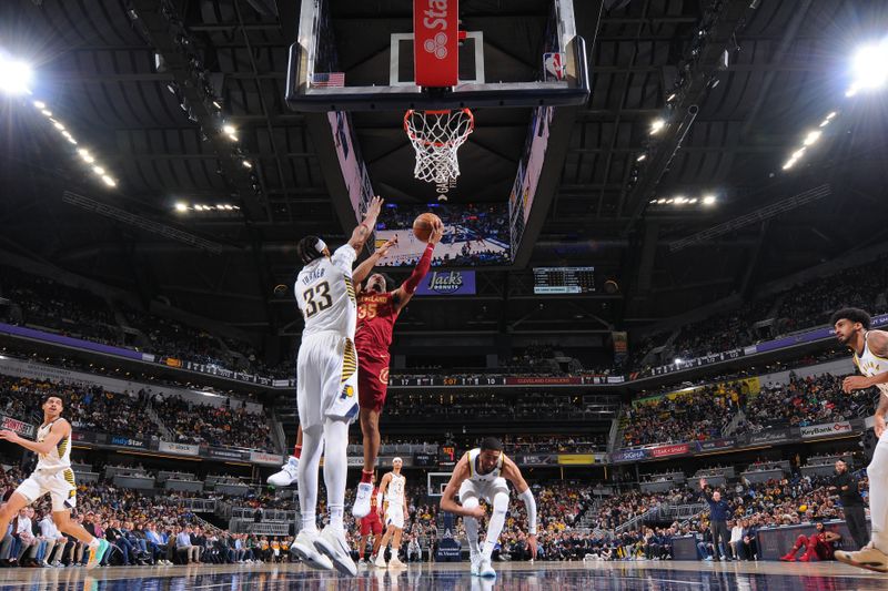 INDIANAPOLIS, IN - MARCH 18:  Isaac Okoro #35 of the Cleveland Cavaliers goes to the basket during the game on March 18, 2024 at Gainbridge Fieldhouse in Indianapolis, Indiana. NOTE TO USER: User expressly acknowledges and agrees that, by downloading and or using this Photograph, user is consenting to the terms and conditions of the Getty Images License Agreement. Mandatory Copyright Notice: Copyright 2024 NBAE (Photo by Ron Hoskins/NBAE via Getty Images)