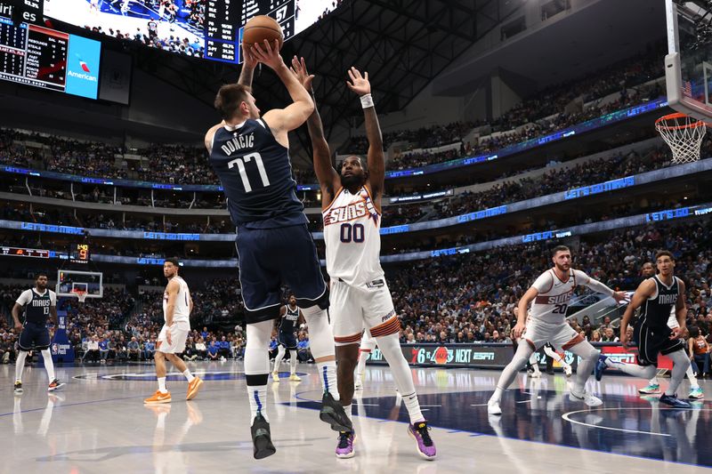 DALLAS, TEXAS - NOVEMBER 08: Luka Doncic #77 of the Dallas Mavericks shoots over Royce O'Neale #00 of the Phoenix Suns during the first half at American Airlines Center on November 08, 2024 in Dallas, Texas. NOTE TO USER: User expressly acknowledges and agrees that, by downloading and or using this photograph, User is consenting to the terms and conditions of the Getty Images License Agreement. (Photo by Sam Hodde/Getty Images)