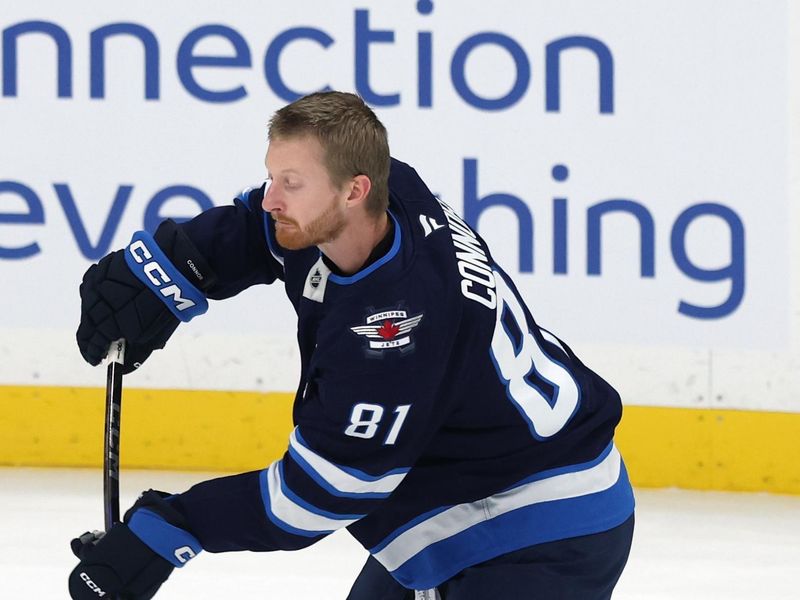 Oct 18, 2025; Winnipeg, Manitoba, CAN; Winnipeg Jets left wing Kyle Connor (81) warms up before a game against the Nashville Predators at Canada Life Centre. Mandatory Credit: James Carey Lauder-Imagn Images