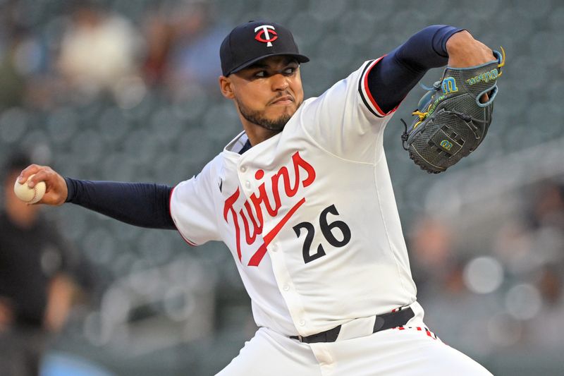 Sep 17, 2025; Minneapolis, Minnesota, USA;  Minnesota Twins starting pitcher Taj Bradley (26) delivers a pitch against the New York Yankees during the first inning at Target Field. Mandatory Credit: Nick Wosika-Imagn Images