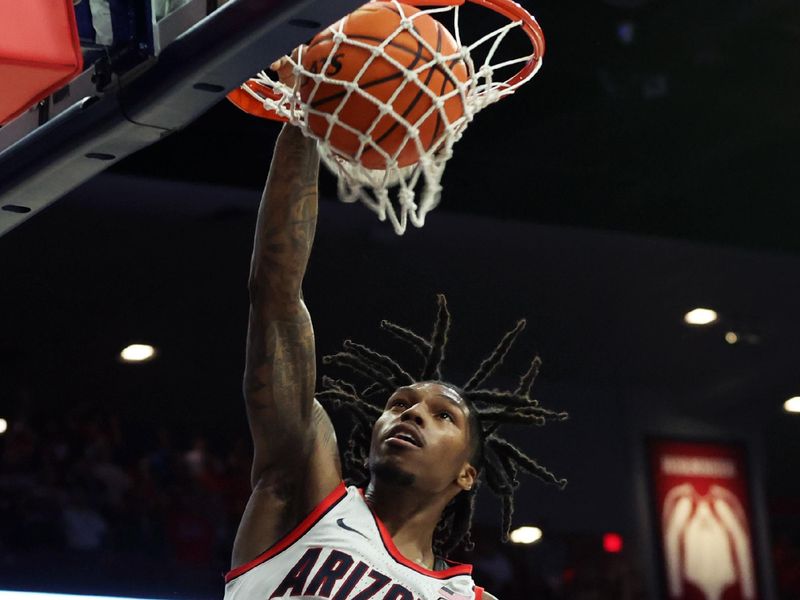 Dec 2, 2023; Tucson, Arizona, USA; Arizona Wildcats guard Caleb Love (2) dunks the ball against the Colgate Raiders during the second half at McKale Center. Mandatory Credit: Zachary BonDurant-USA TODAY Sports