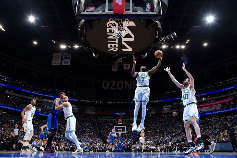 ORLANDO, FL - APRIL 27:   Jaylen Brown #7 of the Boston Celtics goes up for the rebound during the game against the Orlando Magic during Round 1 Game 4 of the 2025 NBA Playoffs on April 27, 2025 at Kia Center in Orlando, Florida. NOTE TO USER: User expressly acknowledges and agrees that, by downloading and or using this photograph, User is consenting to the terms and conditions of the Getty Images License Agreement. Mandatory Copyright Notice: Copyright 2025 NBAE (Photo by Fernando Medina/NBAE via Getty Images)