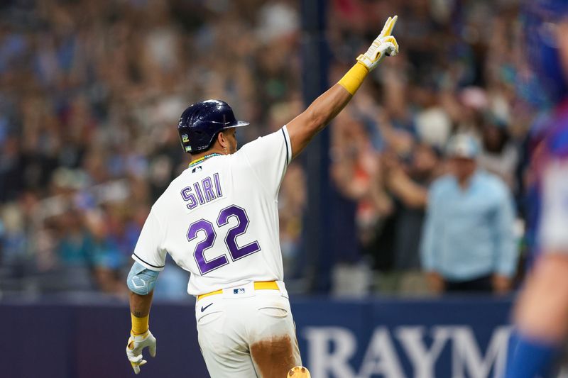 May 26, 2023; St. Petersburg, Florida, USA;  Tampa Bay Rays center fielder Jose Siri (22) reacts after hitting a two run home run against the Los Angeles Dodgers in the eighth inning at Tropicana Field. Mandatory Credit: Nathan Ray Seebeck-USA TODAY Sports