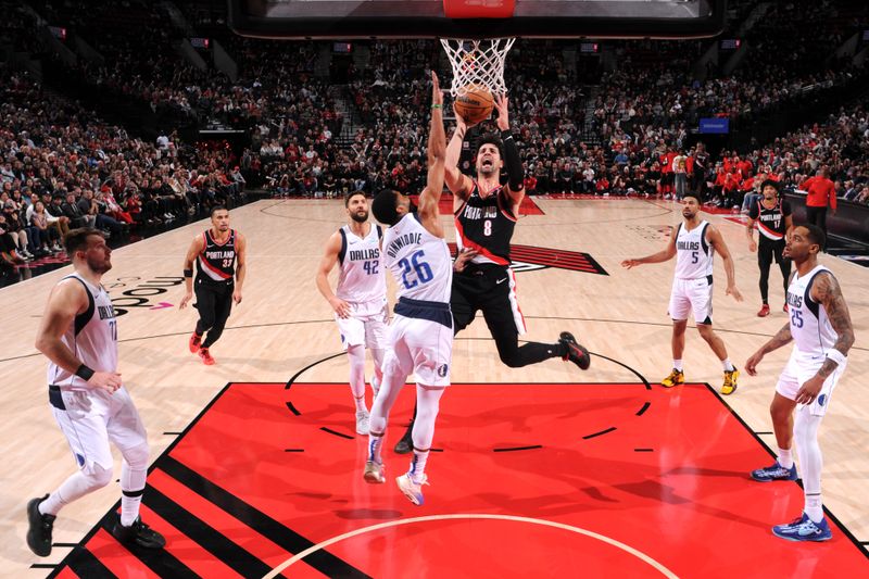 PORTLAND, OR - DECEMBER 1: Deni Avdija #8 of the Portland Trail Blazers drives to the basket during the game against the Dallas Mavericks on December 1, 2024 at the Moda Center Arena in Portland, Oregon. NOTE TO USER: User expressly acknowledges and agrees that, by downloading and or using this photograph, user is consenting to the terms and conditions of the Getty Images License Agreement. Mandatory Copyright Notice: Copyright 2024 NBAE (Photo by Cameron Browne/NBAE via Getty Images)