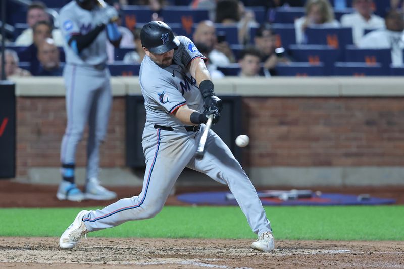 Jun 11, 2024; New York City, New York, USA; Miami Marlins third baseman Jake Burger (36) hits a ground ball to New York Mets third baseman Mark Vientos (not pictured) during the fifth inning at Citi Field. Vientos' throwing error allowed a run to score on the play. Mandatory Credit: Brad Penner-USA TODAY Sports