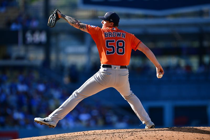 Jun 25, 2023; Los Angeles, California, USA; Houston Astros starting pitcher Hunter Brown (58) throws against the Los Angeles Dodgers during the fourth inning at Dodger Stadium. Mandatory Credit: Gary A. Vasquez-USA TODAY Sports