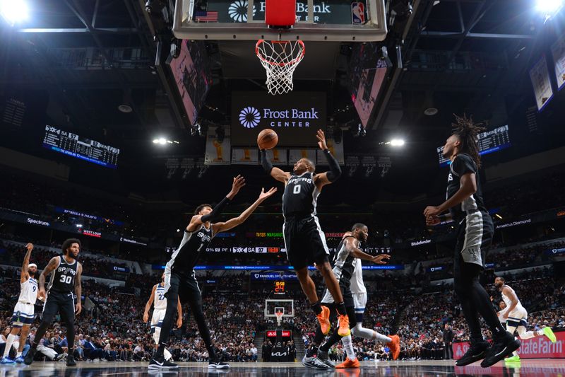 SAN ANTONIO, TX - NOVEMBER 2: Keldon Johnson #0 of the San Antonio Spurs goes up for the rebound during the game against the Minnesota Timberwolves on November 2, 2024 at the Frost Bank Center in San Antonio, Texas. NOTE TO USER: User expressly acknowledges and agrees that, by downloading and or using this photograph, user is consenting to the terms and conditions of the Getty Images License Agreement. Mandatory Copyright Notice: Copyright 2024 NBAE (Photos by Michael Gonzales/NBAE via Getty Images)