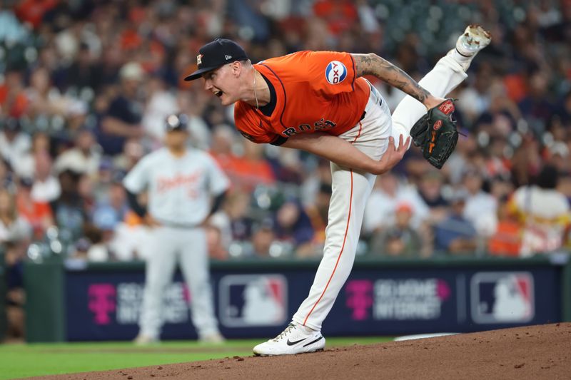 Oct 2, 2024; Houston, Texas, USA; Houston Astros pitcher Hunter Brown (58) throws against the Detroit Tigers during the first inning of game two of the Wildcard round for the 2024 MLB Playoffs at Minute Maid Park. Mandatory Credit: Thomas Shea-Imagn Images