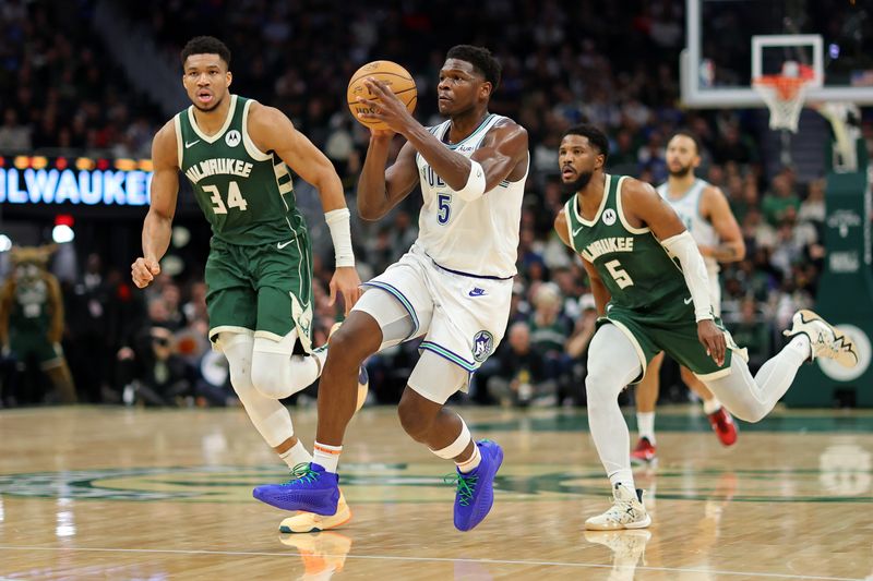 MILWAUKEE, WISCONSIN - FEBRUARY 08: Anthony Edwards #5 of the Minnesota Timberwolves handles the ball during a game against the Milwaukee Bucks at Fiserv Forum on February 08, 2024 in Milwaukee, Wisconsin. NOTE TO USER: User expressly acknowledges and agrees that, by downloading and or using this photograph, User is consenting to the terms and conditions of the Getty Images License Agreement. (Photo by Stacy Revere/Getty Images)