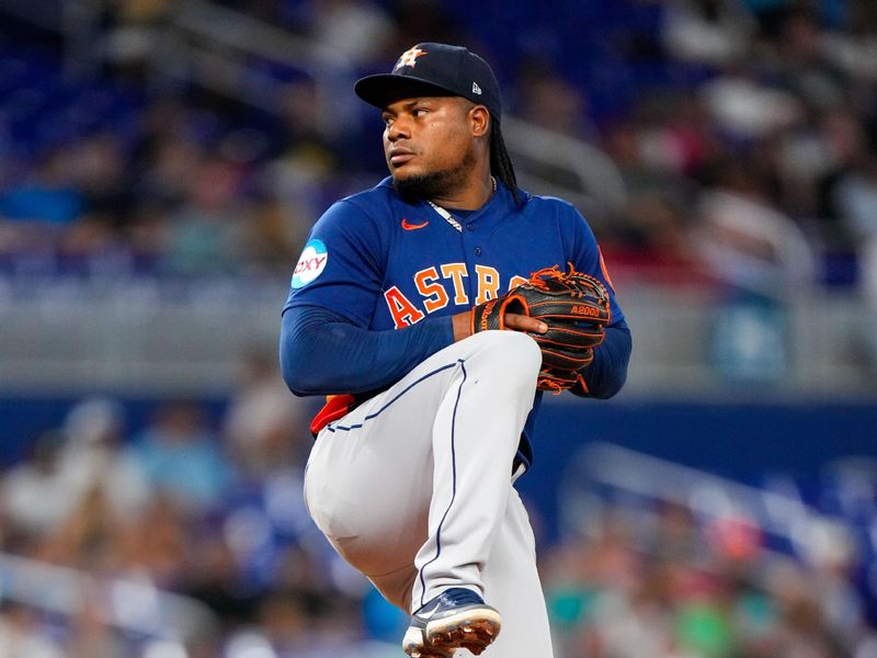 Aug 14, 2023; Miami, Florida, USA; Houston Astros starting pitcher Framber Valdez (59) throws a pitch against the Miami Marlins during the first inning at loanDepot Park. Mandatory Credit: Rich Storry-USA TODAY Sports