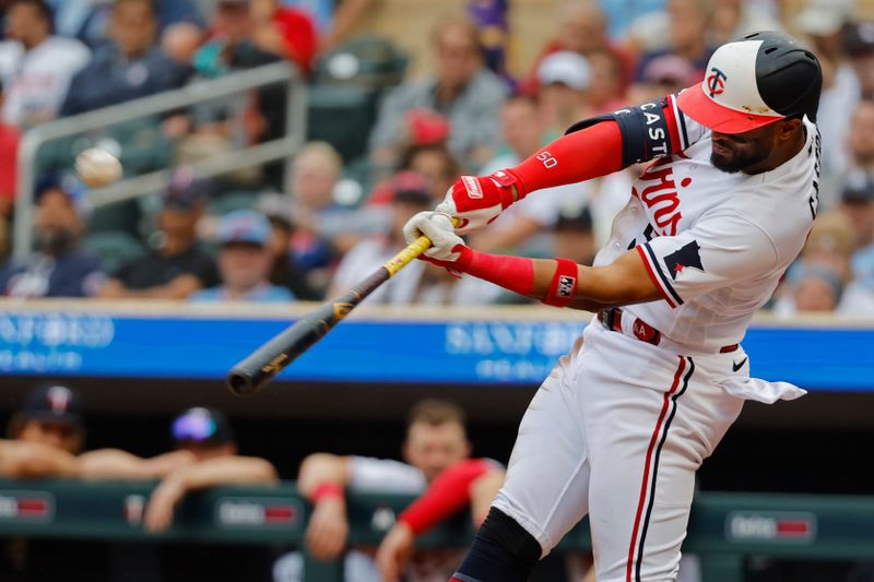 Sep 9, 2023; Minneapolis, Minnesota, USA; Minnesota Twins left fielder Willi Castro (50) hits a solo home run against the New York Mets in the eighth inning at Target Field. Mandatory Credit: Bruce Kluckhohn-USA TODAY Sports